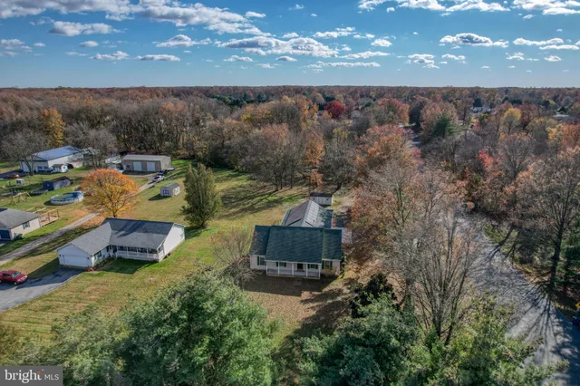 an aerial view of a house with a garden