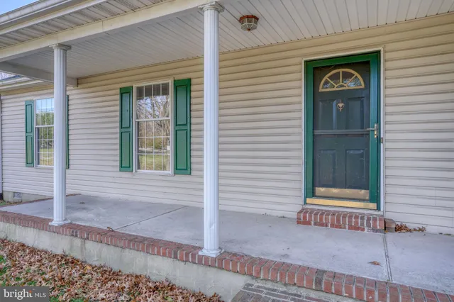 a front view of a house with garage