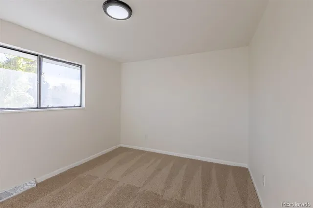 an empty room with a window