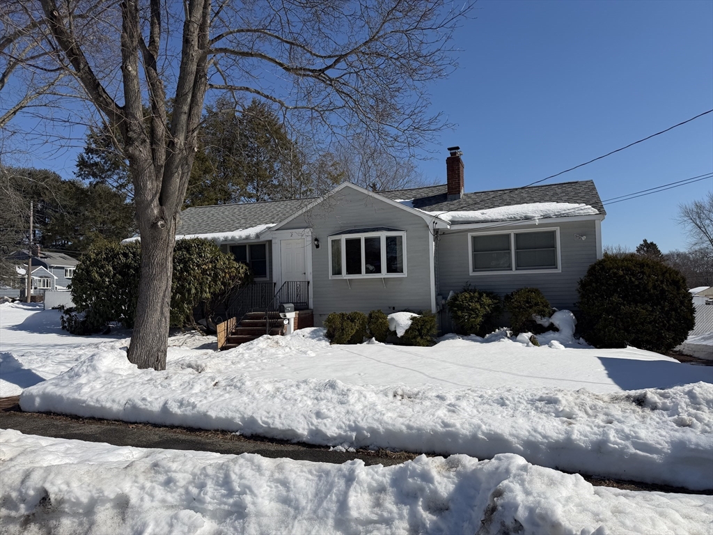 a view of a yard covered with snow