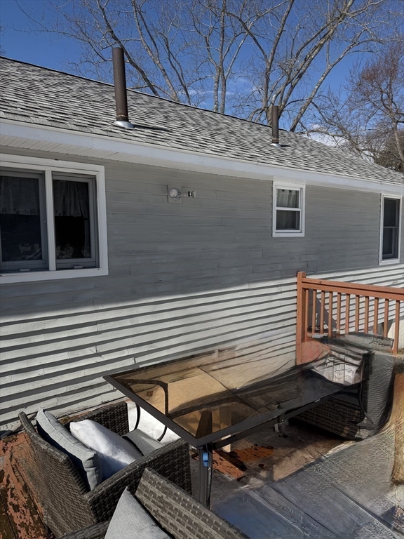 2 Sachem Road Peabody, MA 01960 - Photo 17 of 21 a view of a balcony with two chairs