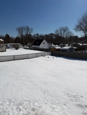 a view of a house with a snow