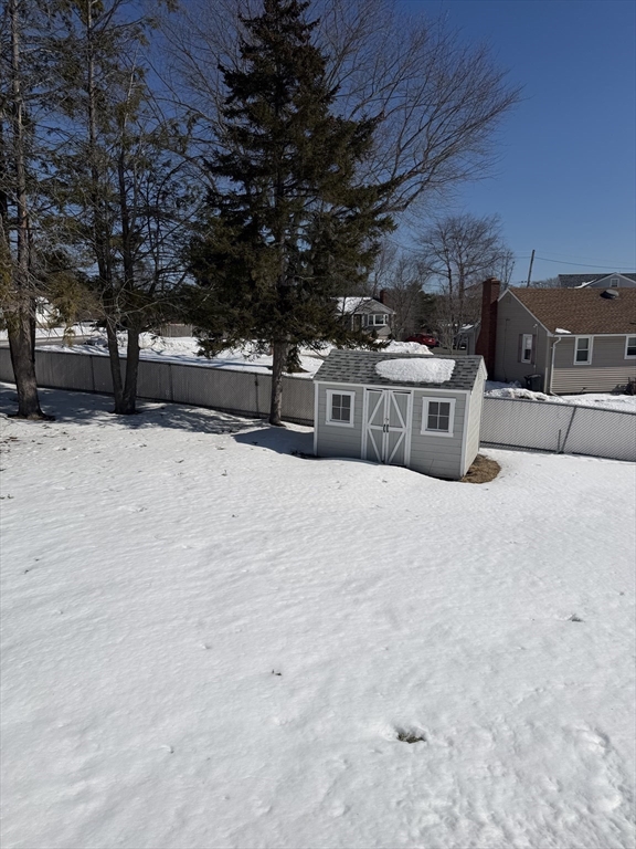 2 Sachem Road Peabody, MA 01960 - Photo 20 of 21 a view of a house with a snow