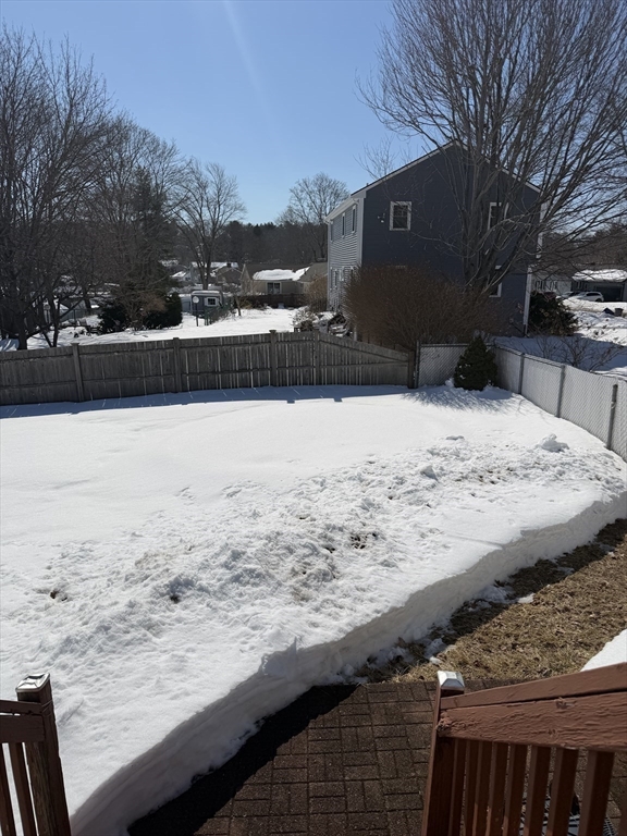 2 Sachem Road Peabody, MA 01960 - Photo 21 of 21 a view of a yard with snow on the road