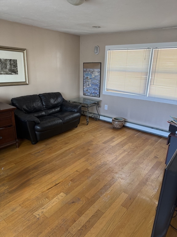 2 Sachem Road Peabody, MA 01960 - Photo 7 of 21 a living room with furniture and a window