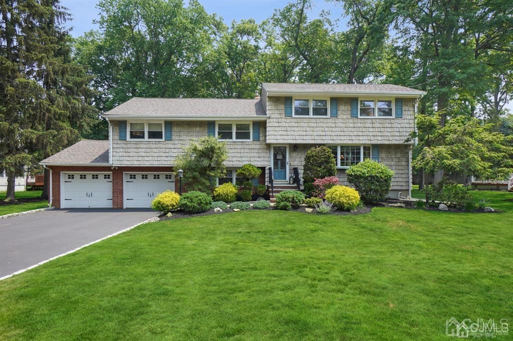 8 Tamarack Road Edison, NJ 08820 - Photo 1 of 31 a front view of house with yard and green space