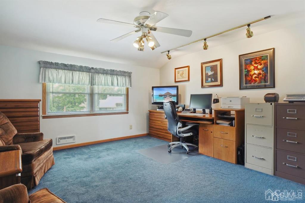 8 Tamarack Road Edison, NJ 08820 - Photo 20 of 31 a view of a workspace with furniture and a window