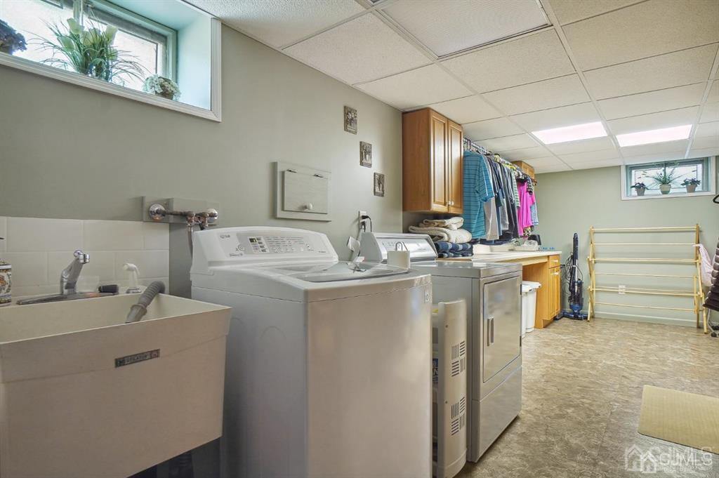 8 Tamarack Road Edison, NJ 08820 - Photo 23 of 31 a utility room with dryer and washer