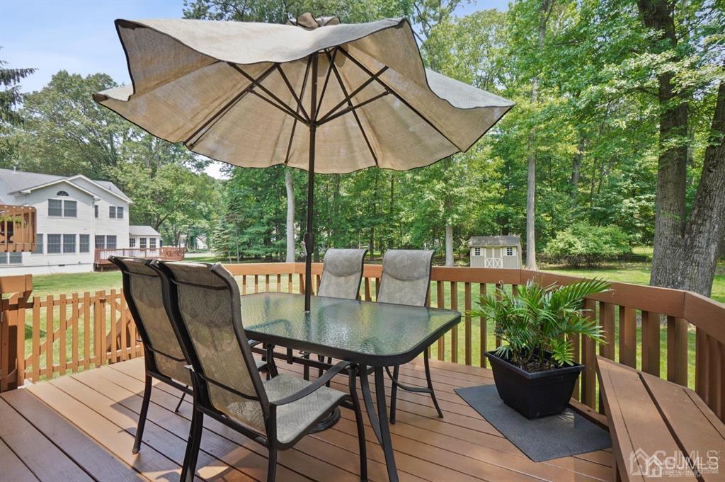8 Tamarack Road Edison, NJ 08820 - Photo 25 of 31 a view of balcony with furniture and wooden deck