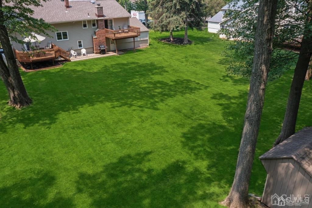 8 Tamarack Road Edison, NJ 08820 - Photo 30 of 31 a view of a house with a back yard