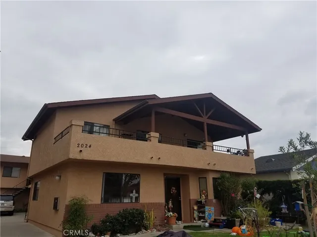 a view of a building with a street