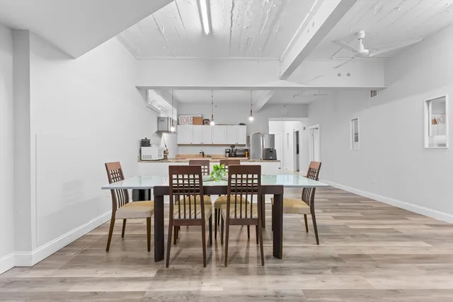 a view of a dining room with furniture