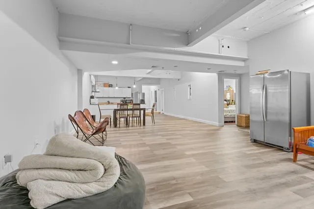 a living room with furniture and a table