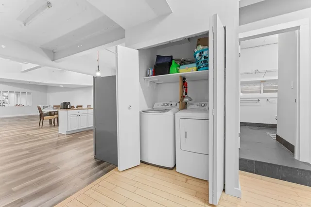 a view of kitchen and wooden floor