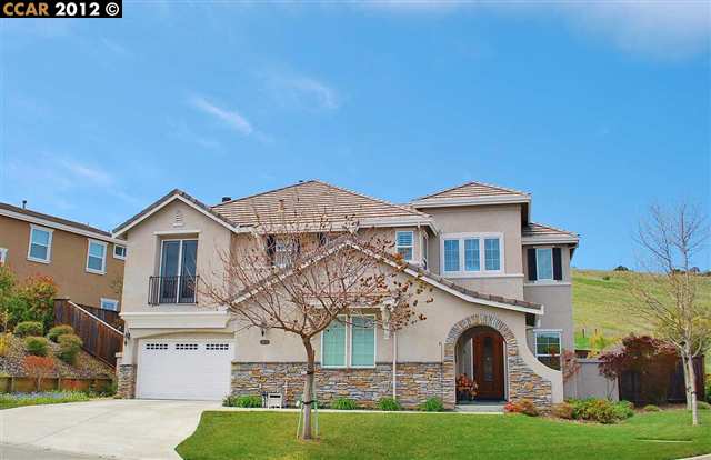 995 Maplegate Court Concord, CA 94521 - Photo 1 of 1 a front view of a house with garden