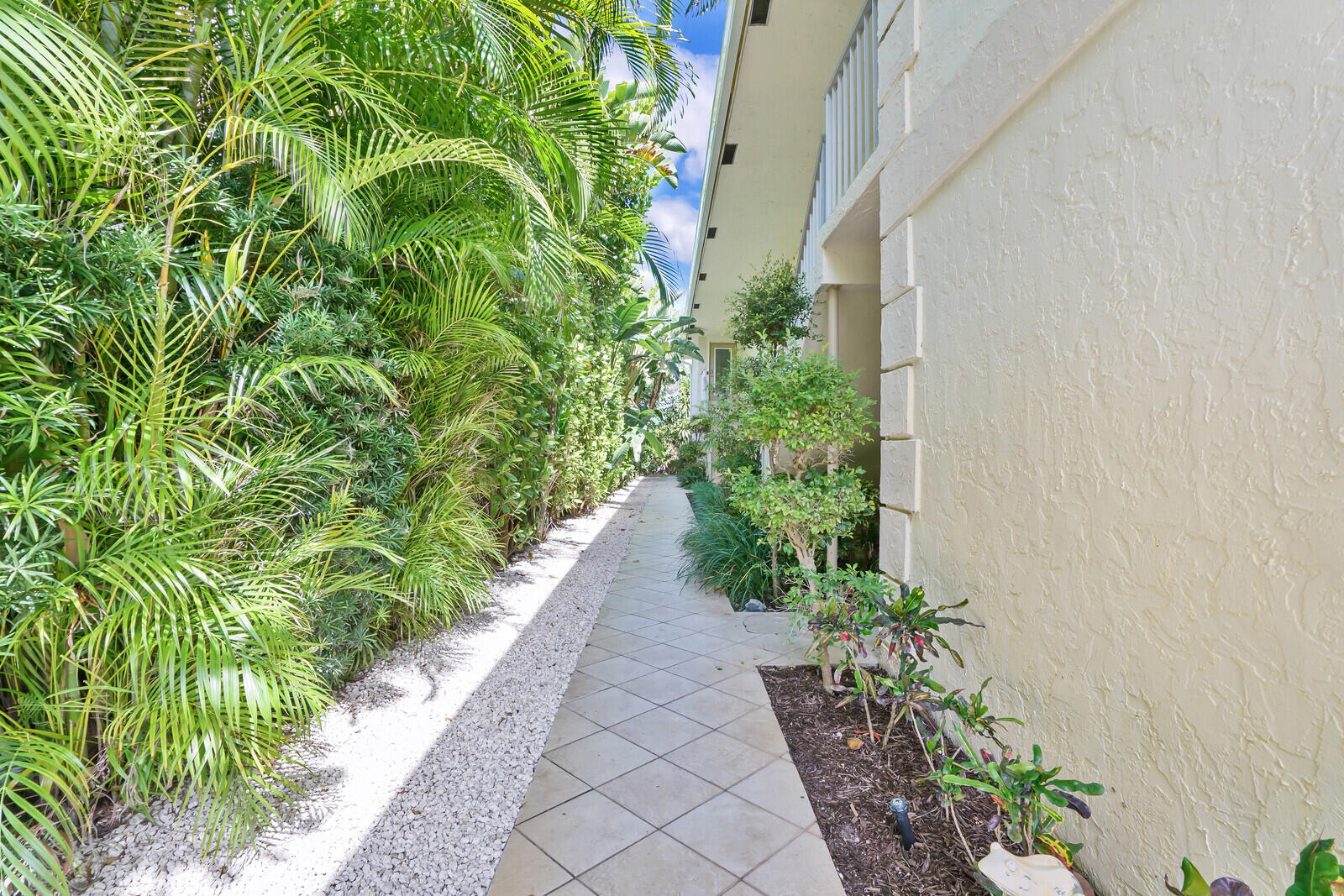 107 Inlet Way, Unit 3 Palm Beach Shores, FL 33404 - Photo 6 of 49 Landscaped Entrance