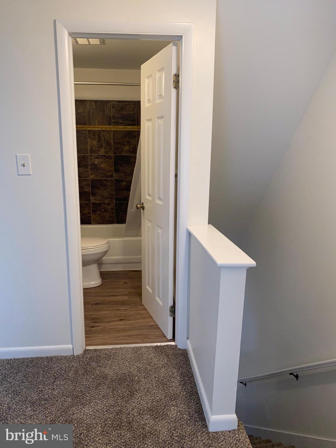 323 East Chestnut Street, Unit 5 Coatesville, PA 19320 - Photo 3 of 7 a view of a bathroom with a sink