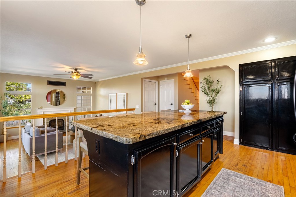10885 San Marcos Road Atascadero, CA 93422 - Photo 15 of 63 a kitchen with stainless steel appliances granite countertop wooden cabinets and a refrigerator