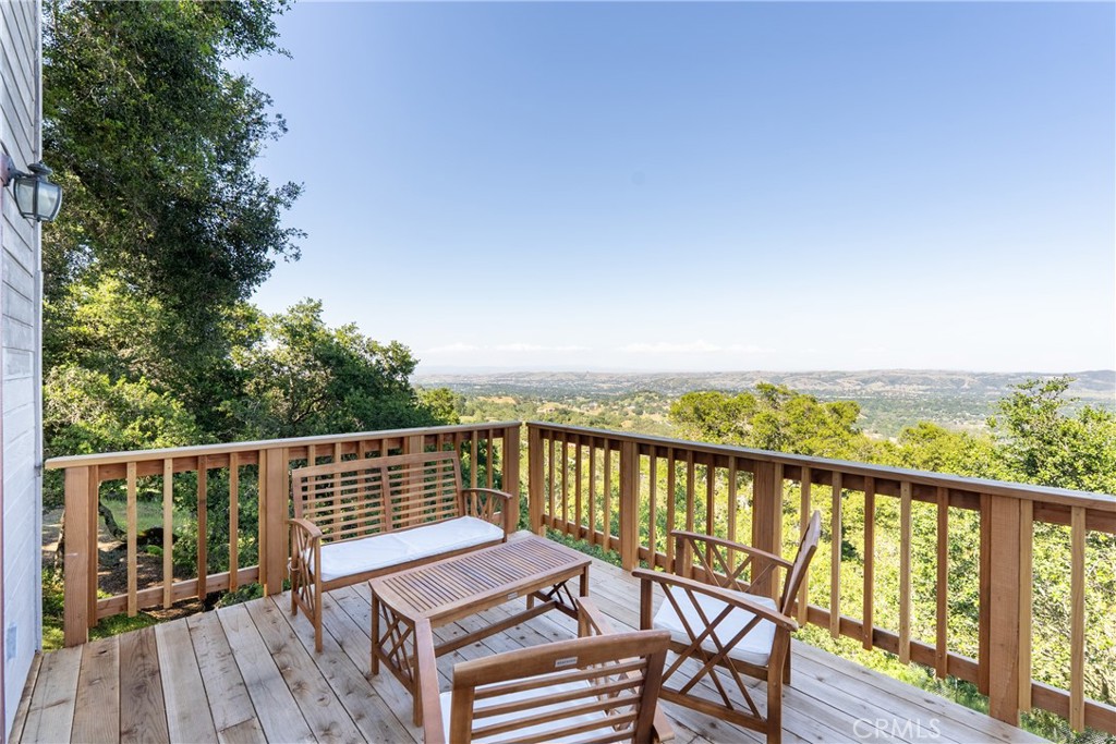 10885 San Marcos Road Atascadero, CA 93422 - Photo 49 of 63 a view of a balcony with wooden floor and fence