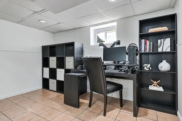 a kitchen with stainless steel appliances granite countertop a refrigerator and a stove