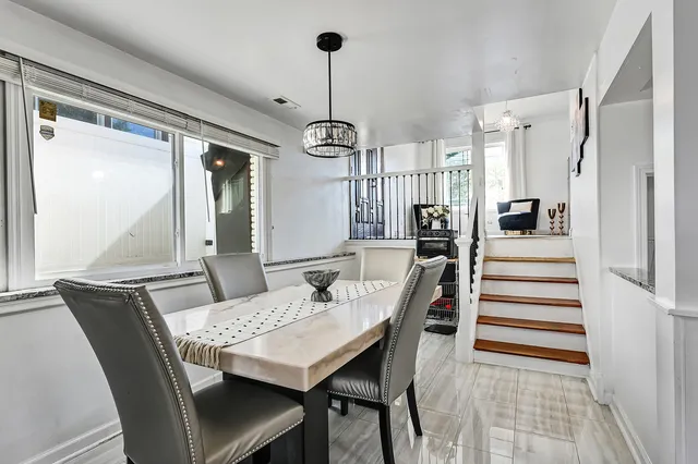 a view of a dining room with furniture