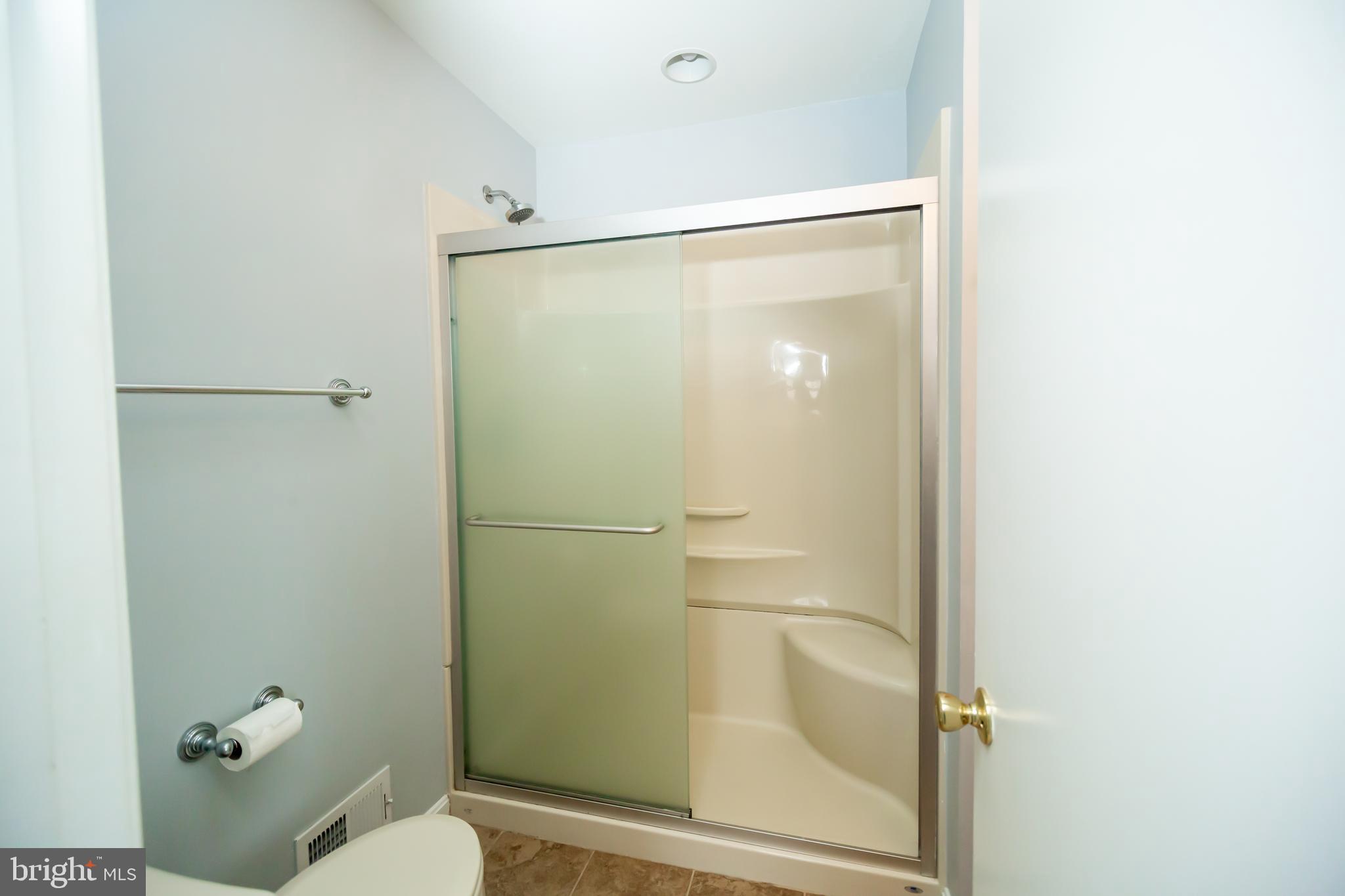 11623 Rivershore Drive Dunkirk, MD 20754 - Photo 31 of 49 a bathroom with a granite countertop mirror