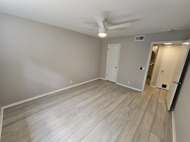 a kitchen with stainless steel appliances a refrigerator a stove a sink and dishwasher
