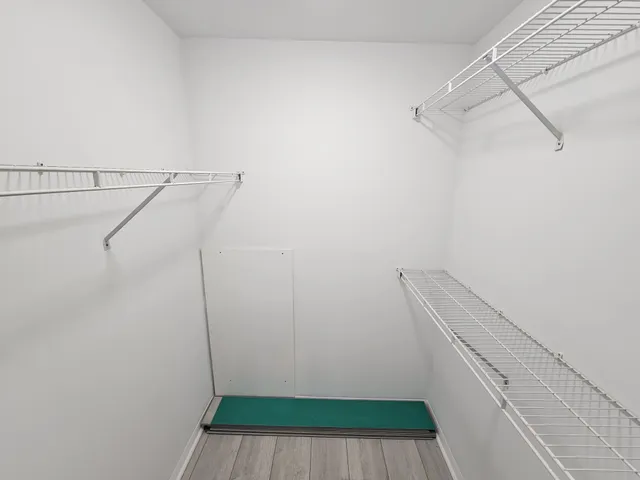 a kitchen with stainless steel appliances granite countertop a sink counter space cabinets and a stove