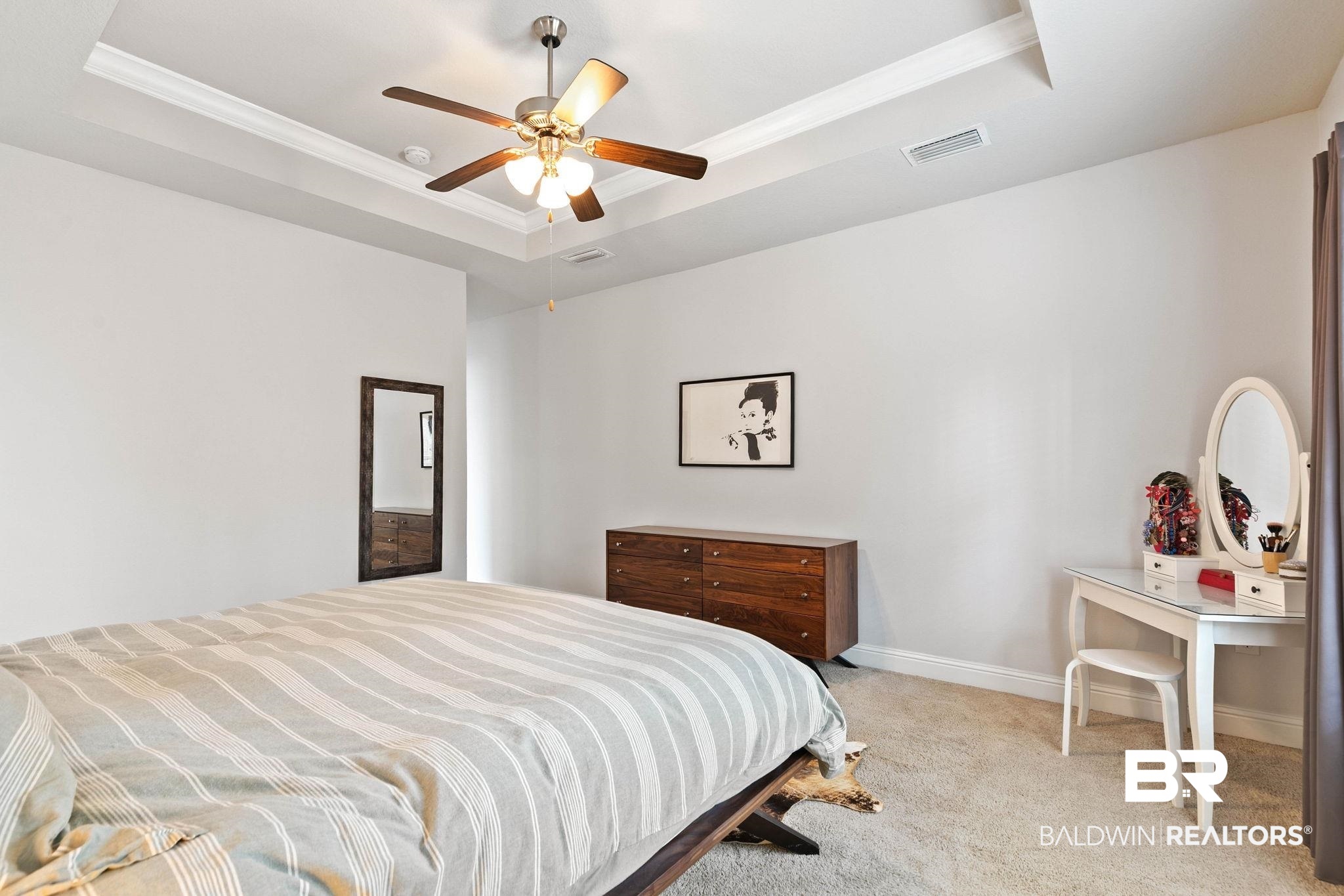 31350 Hoot Owl Road Daphne, AL 36527 - Photo 25 of 94 Bedroom featuring crown molding, light colored carpet, ceiling fan, and a tray ceiling