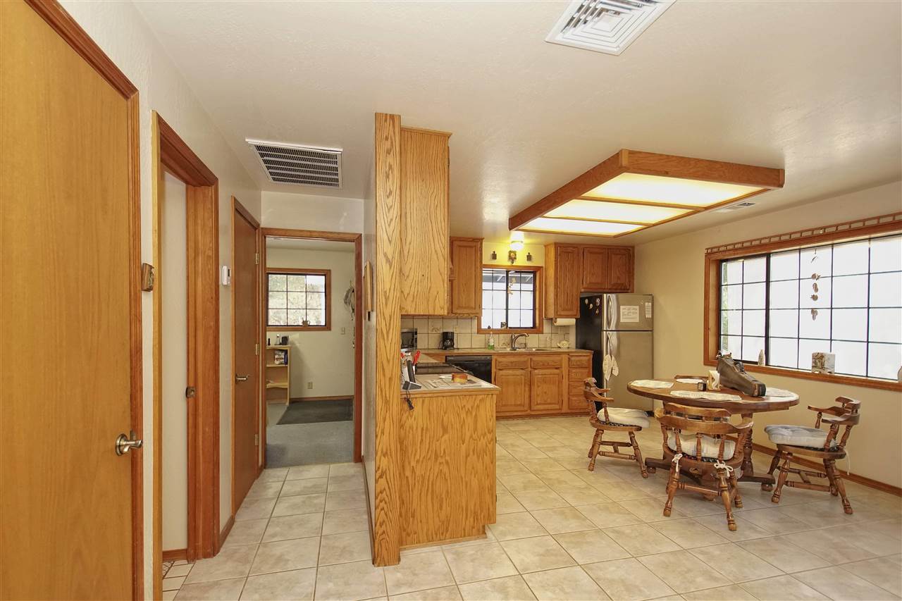 12455 Wilder Road Red Bluff, CA 96080 - Photo 16 of 73 a view of a livingroom with furniture and a window