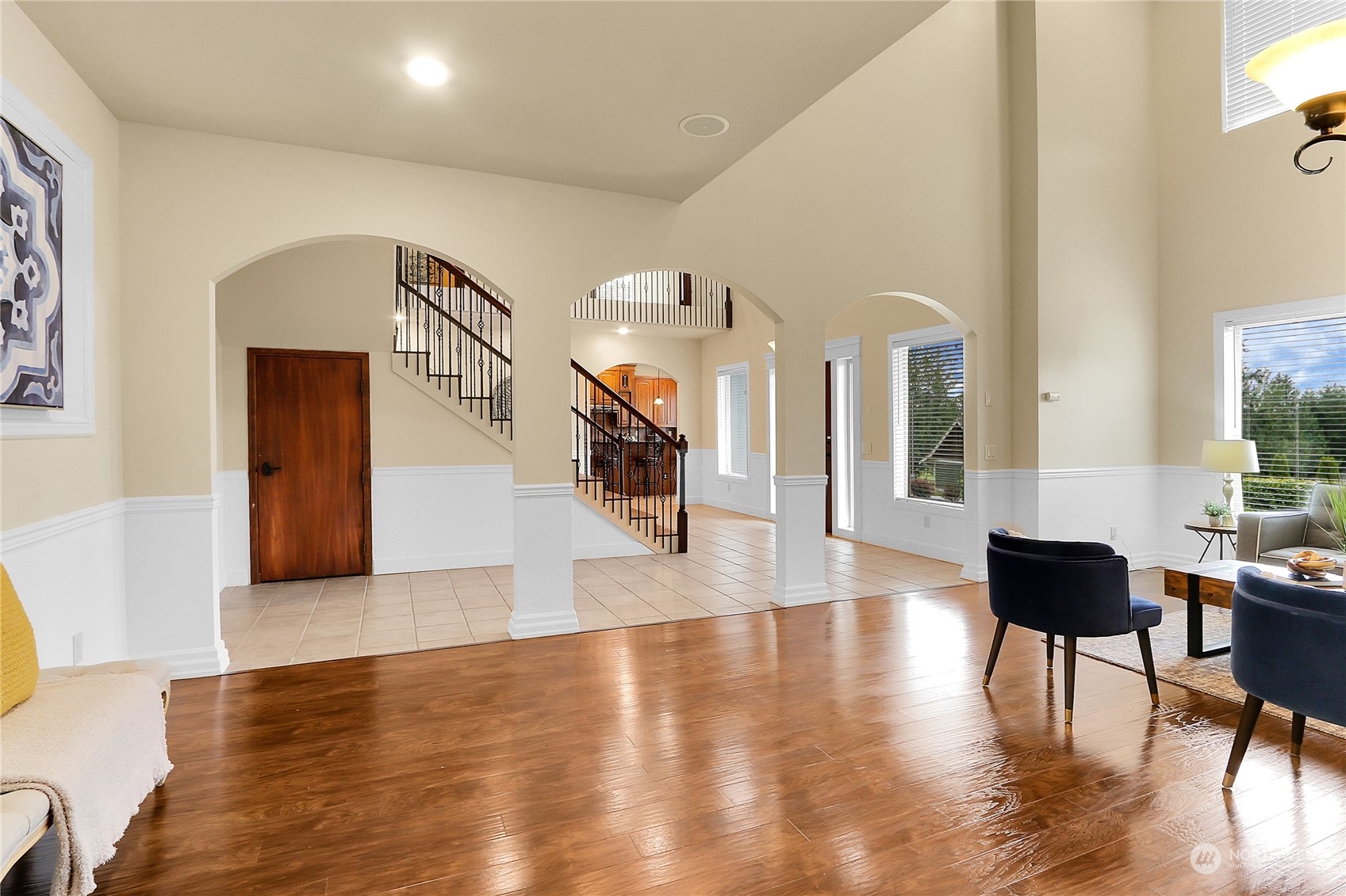 13921 Jim Creek Road Arlington, WA 98223 - Photo 12 of 35 a view of a living room filled with furniture and wooden floor