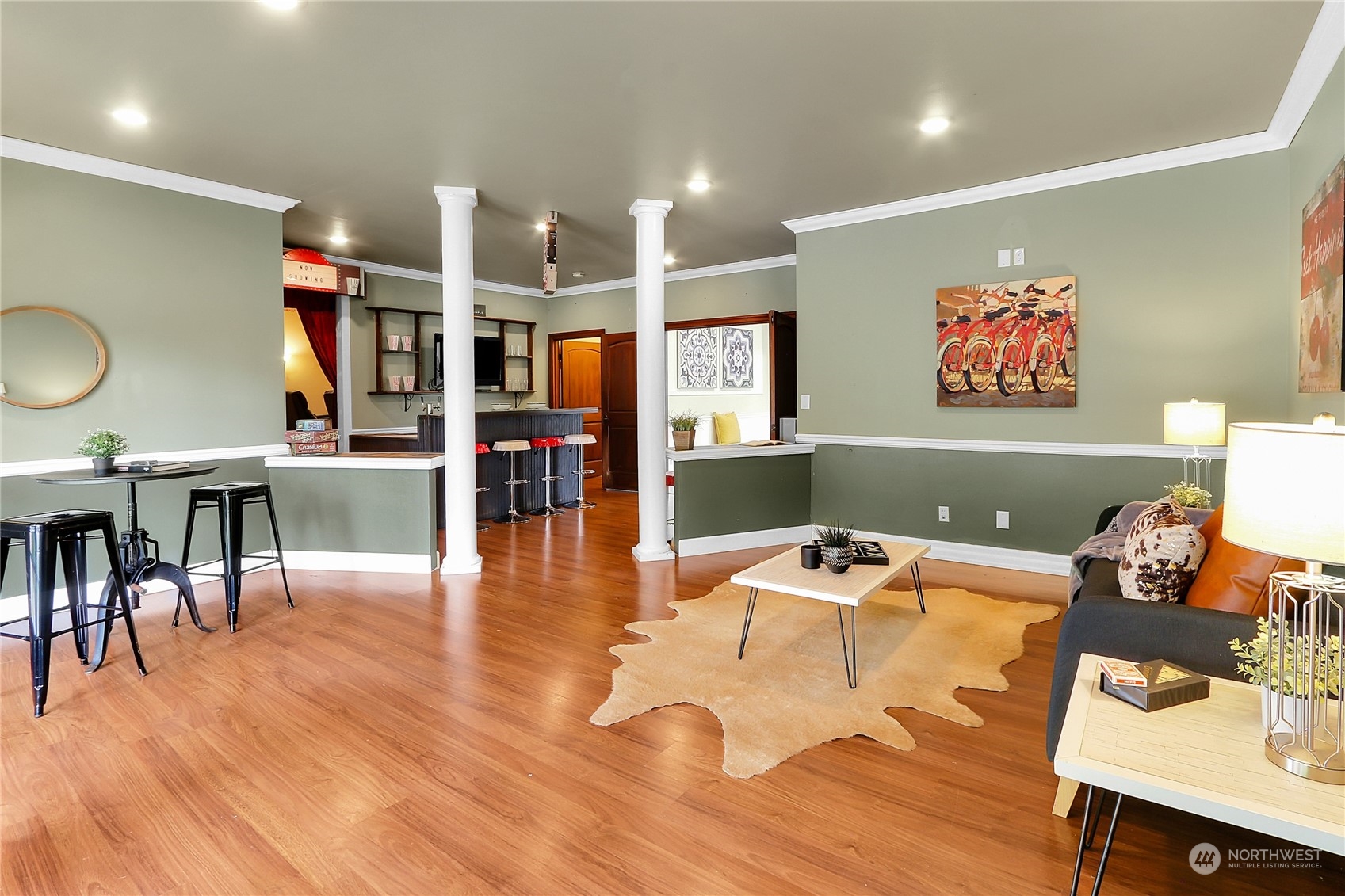13921 Jim Creek Road Arlington, WA 98223 - Photo 16 of 35 a room with furniture and wooden floor
