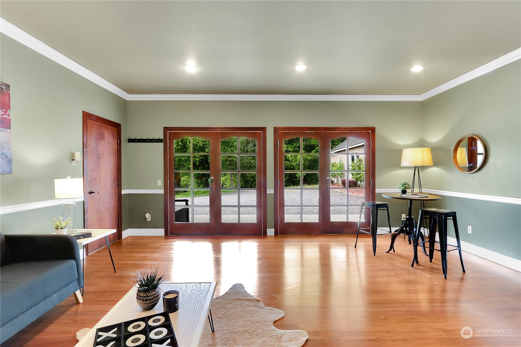 13921 Jim Creek Road Arlington, WA 98223 - Photo 17 of 35 a living room with furniture and a large window