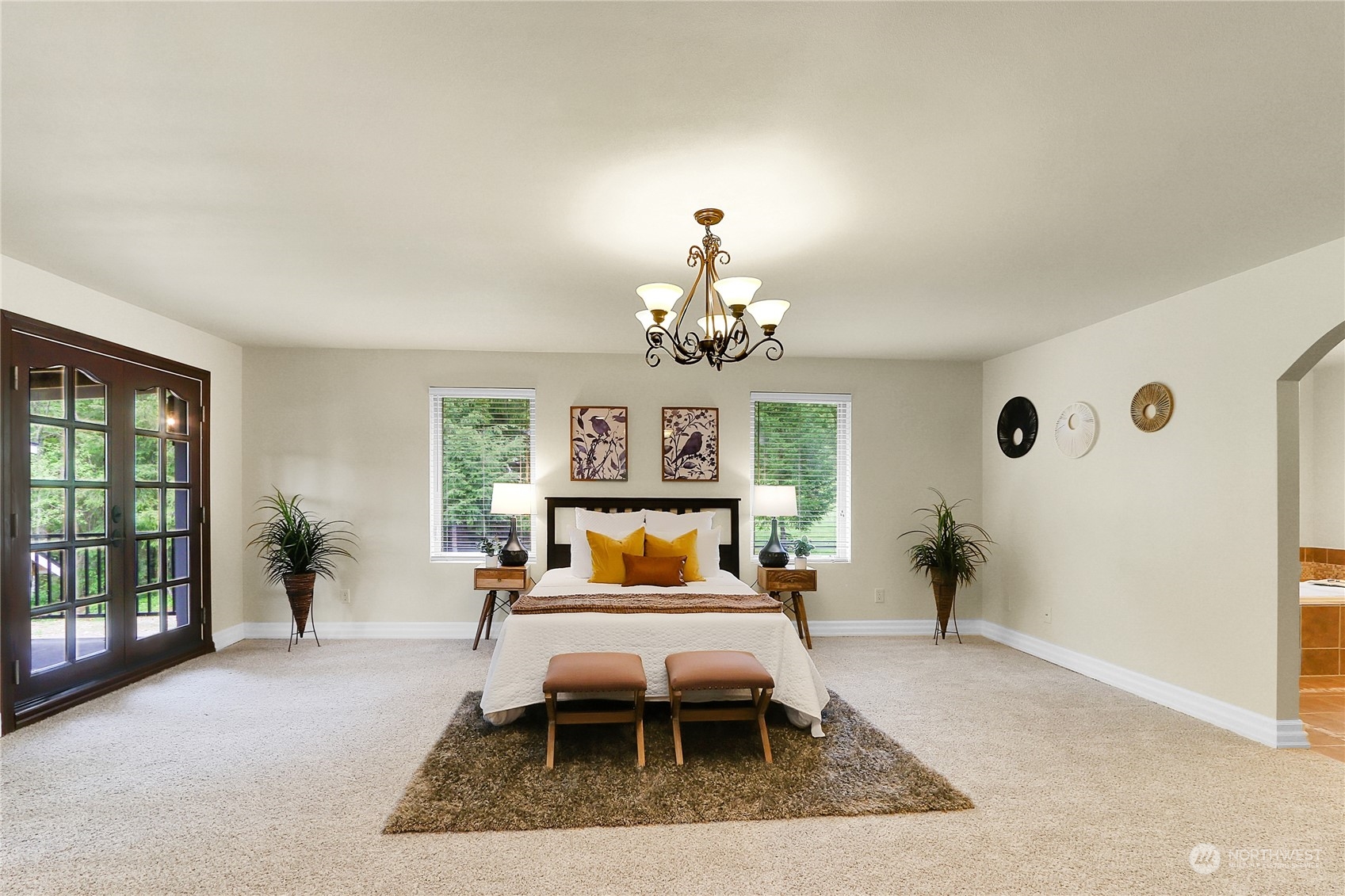 13921 Jim Creek Road Arlington, WA 98223 - Photo 21 of 35 a living room with furniture and a chandelier