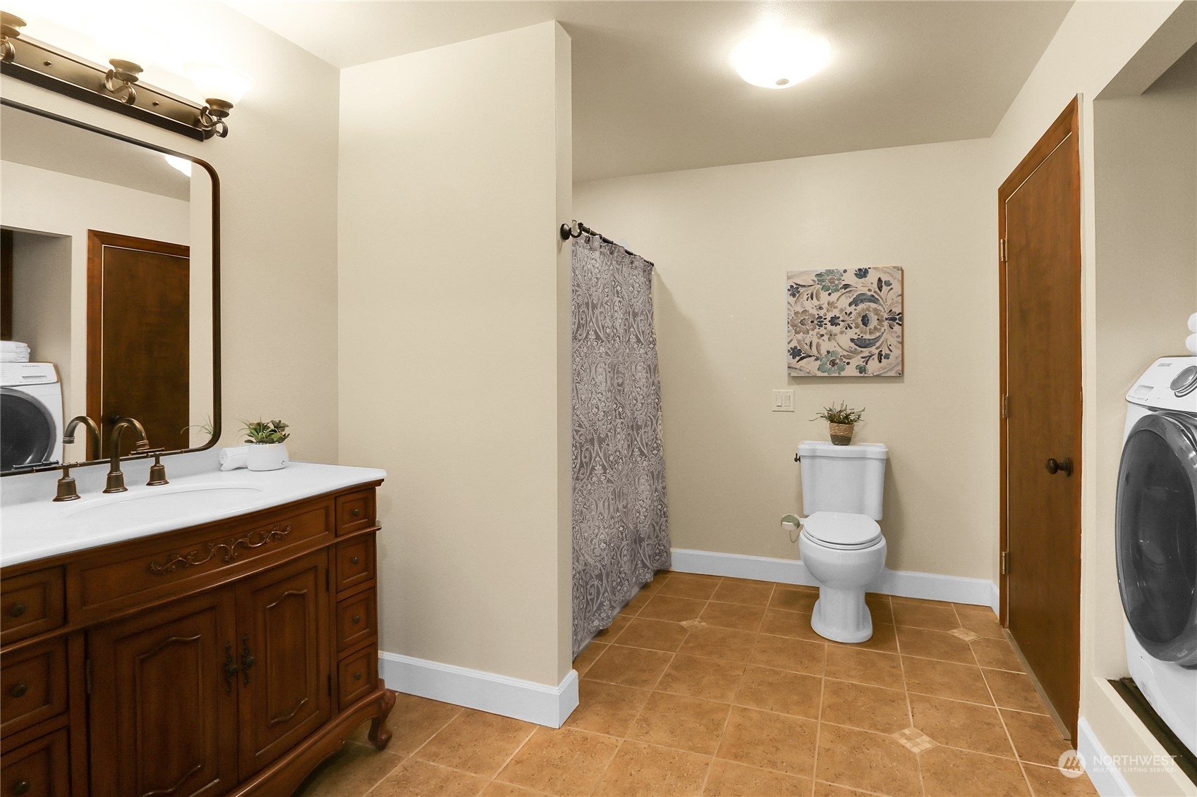 13921 Jim Creek Road Arlington, WA 98223 - Photo 27 of 35 a bathroom with a toilet sink and shower