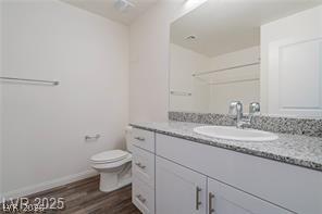 12347 Indigo Montage Road, Unit 3 Las Vegas, NV 89183 - Photo 15 of 23 A sleek vanity with granite counters and ample storage defines this well-appointed bath.