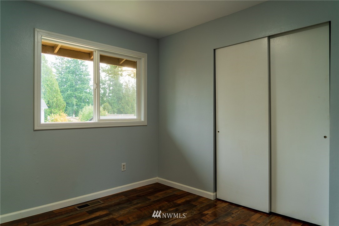 21812 2nd Avenue Southeast Bothell, WA 98021 - Photo 16 of 25 an empty room with a window