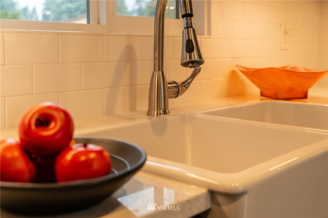 21812 2nd Avenue Southeast Bothell, WA 98021 - Photo 3 of 25 a view of a bathtub in a bathroom