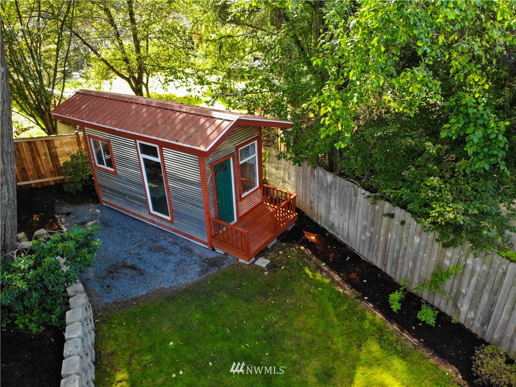 21812 2nd Avenue Southeast Bothell, WA 98021 - Photo 22 of 25 a view of a house with a small yard and wooden fence
