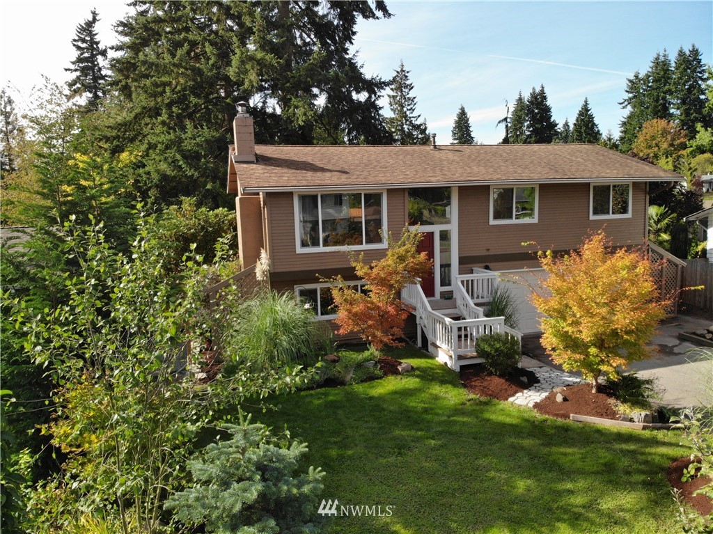 21812 2nd Avenue Southeast Bothell, WA 98021 - Photo 25 of 25 a view of a house with backyard sitting area and garden