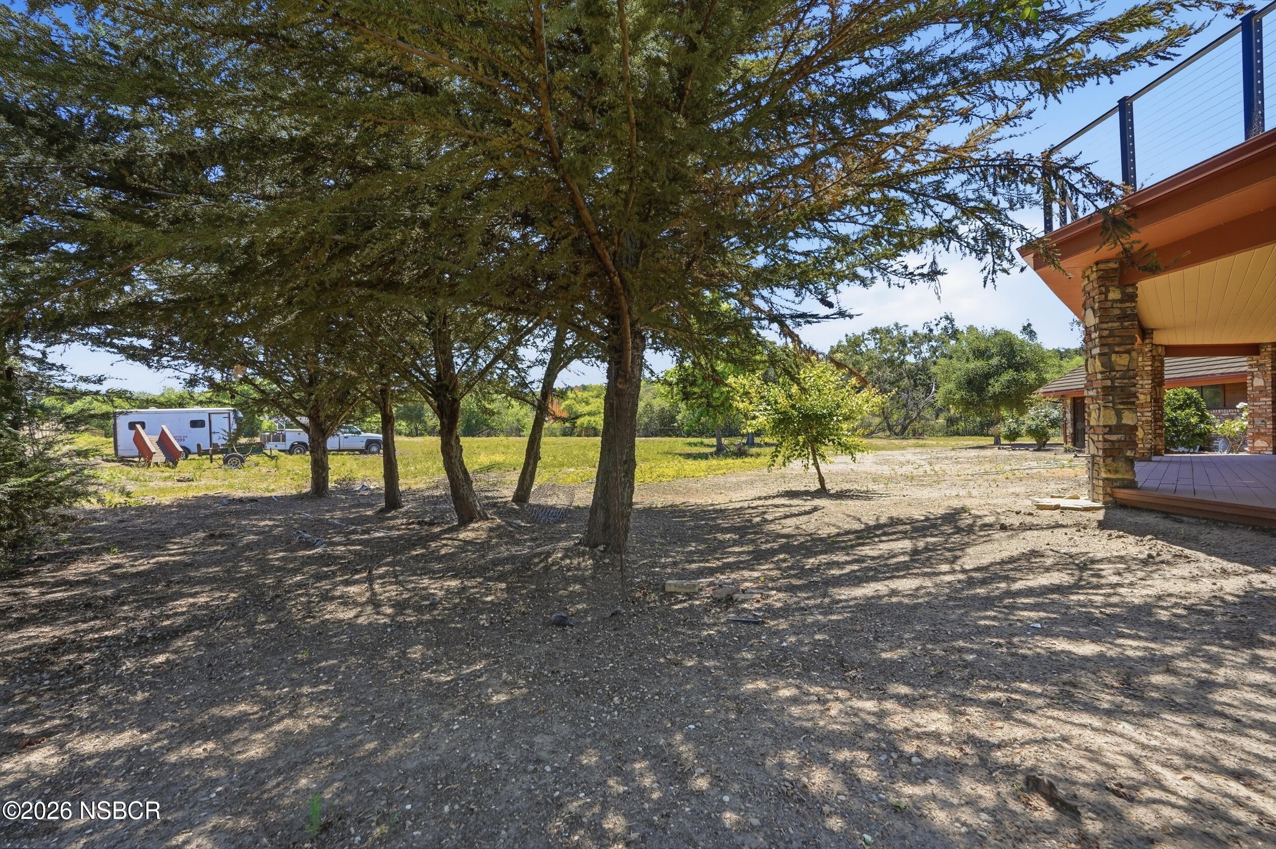 140 East Rice Ranch Road Santa Maria, CA 93455 - Photo 36 of 44 a view of a trees with a yard