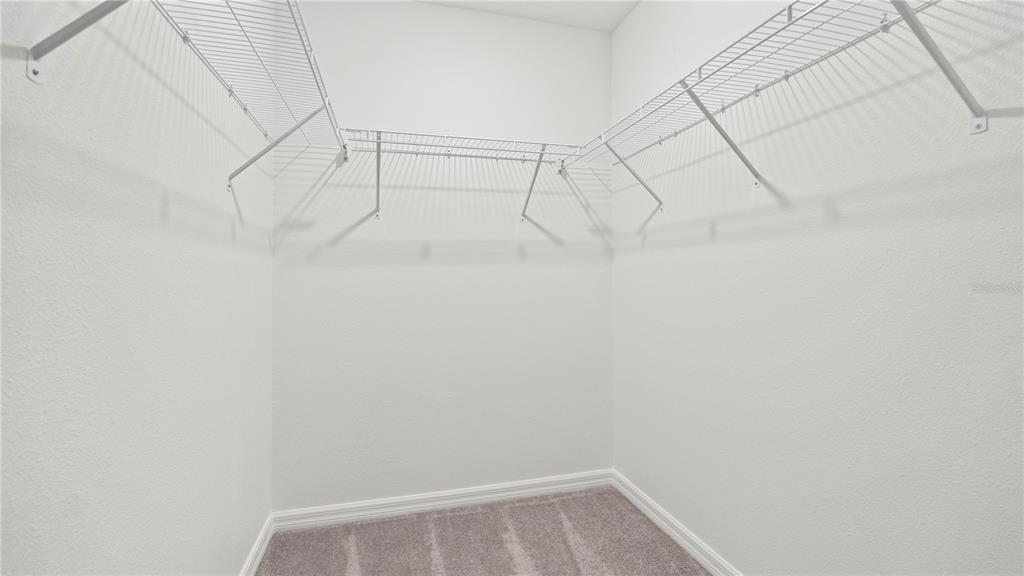 7231 Spring Snowflake Avenue Tampa, FL 33619 - Photo 25 of 46 a view of small space with racks on the wall