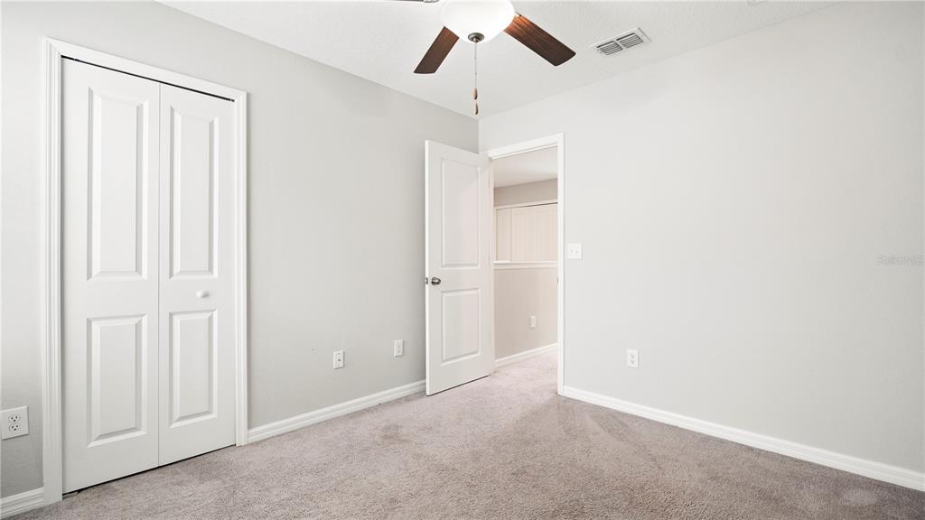 7231 Spring Snowflake Avenue Tampa, FL 33619 - Photo 30 of 46 an empty room with chandelier fan