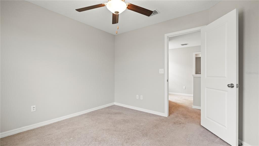 7231 Spring Snowflake Avenue Tampa, FL 33619 - Photo 38 of 46 wooden floor in an empty room