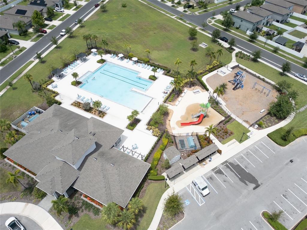 7231 Spring Snowflake Avenue Tampa, FL 33619 - Photo 41 of 46 an aerial view of a house with a yard