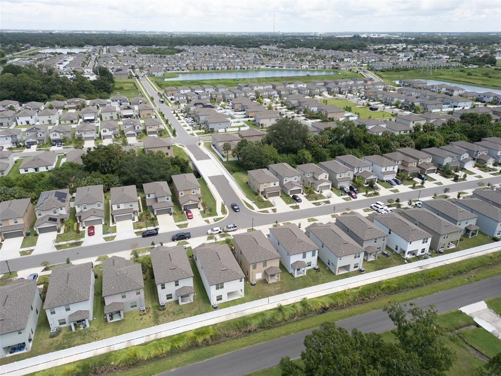7231 Spring Snowflake Avenue Tampa, FL 33619 - Photo 42 of 46 a view of a city with an ocean view