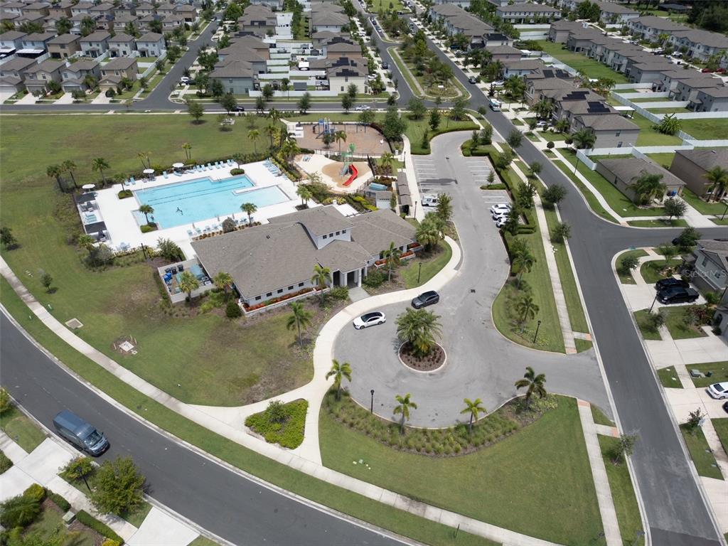 7231 Spring Snowflake Avenue Tampa, FL 33619 - Photo 43 of 46 an aerial view of a house with outdoor space