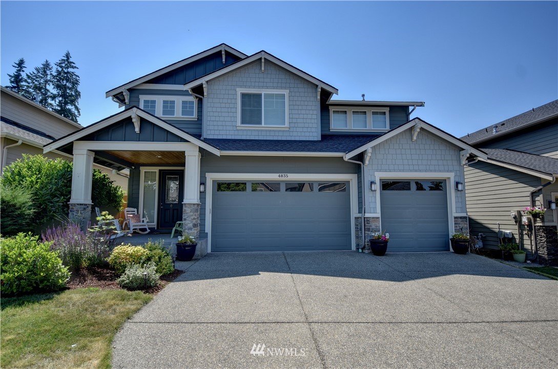 4835 Rosa Court Lacey, WA 98503 - Photo 1 of 40 a front view of a house with garden