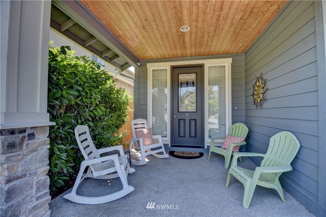 4835 Rosa Court Lacey, WA 98503 - Photo 2 of 40 a balcony with furniture and a potted plant