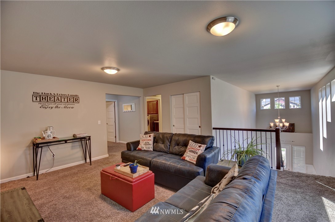 4835 Rosa Court Lacey, WA 98503 - Photo 18 of 40 a living room with furniture and a window